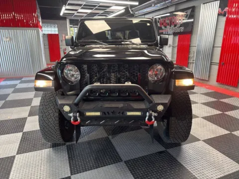 Another view of 2021 Jeep Gladiator Sport 4x4 4dr Crew Cab 5.0 ft. SB for sale in Royal Oak, MI at Victory Motors Royal Oak