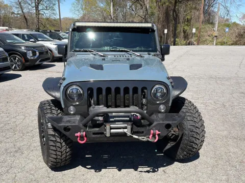 Blue 2015 Jeep Wrangler Unlimited Sport for sale in Canton, GA