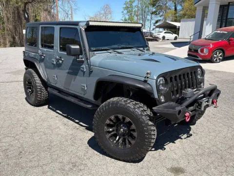 Photos of 2015 Jeep Wrangler Unlimited Sport for sale in Canton, GA at Cherokee Mitsubishi