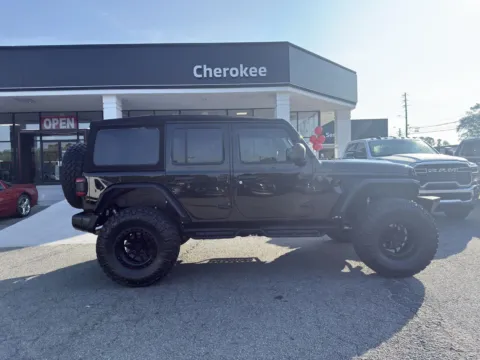 Photos of 2024 Jeep Wrangler Sport S for sale in Canton, GA at Cherokee Mitsubishi