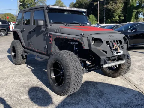 Black 2014 Jeep Wrangler Unlimited Sport for sale in Canton, GA