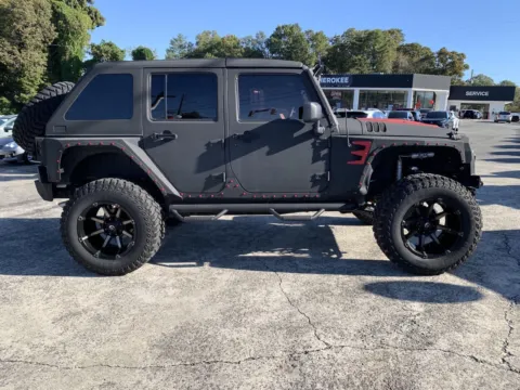 Photos of 2014 Jeep Wrangler Unlimited Sport for sale in Canton, GA at Cherokee Mitsubishi