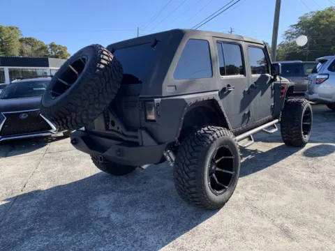 Another view of 2014 Jeep Wrangler Unlimited Sport for sale in Canton, GA at Cherokee Mitsubishi