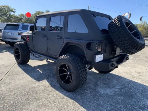 More photos of 2014 Jeep Wrangler Unlimited Sport at Cherokee Mitsubishi, GA