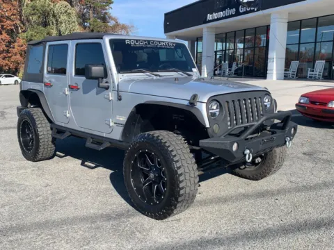 Silver 2010 Jeep Wrangler Unlimited Sahara for sale in Canton, GA