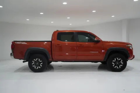 Orange 2016 Toyota Tacoma Double Cab TRD Off-Road Pickup 4D 5 ft for sale in El Paso, TX