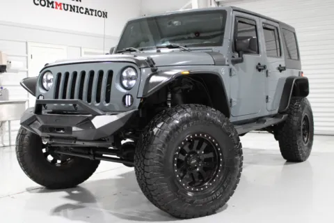 Gray 2015 Jeep Wrangler Unlimited for sale in Hattiesburg, MS
