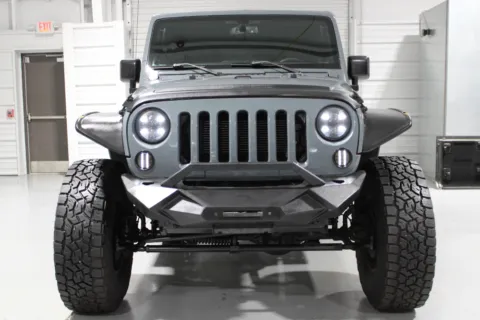 Another view of 2015 Jeep Wrangler Unlimited for sale in Hattiesburg, MS at Custom Truck Concepts