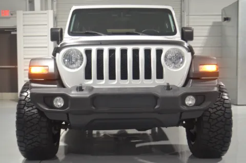 Photos of 2020 Jeep Wrangler Unlimited SPORT WHITE for sale in Hattiesburg, MS at Custom Truck Concepts