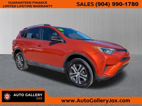 Red 2016 Toyota RAV4 LE for sale in Jacksonville, FL