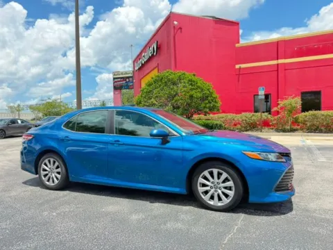 Blue 2020 Toyota Camry LE for sale in Jacksonville, FL