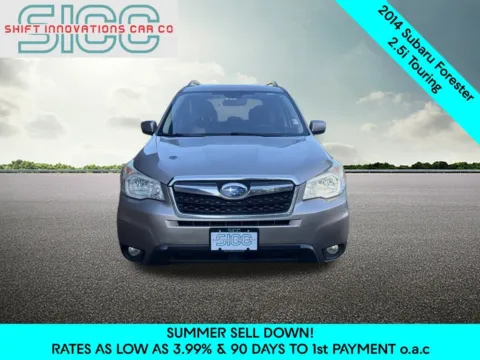 Photos of 2014 Subaru Forester 2.5i Touring for sale in Puyallup, WA at Shift Innovations Car Co
