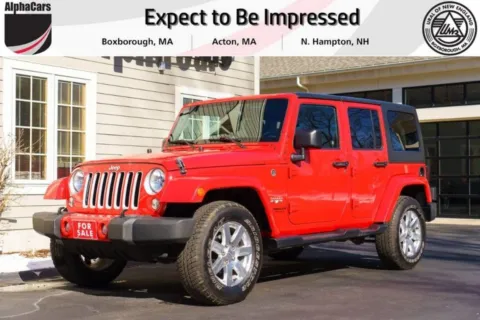 Red 2016 Jeep Wrangler Unlimited Sahara 4WD for sale in North Hampton, NH