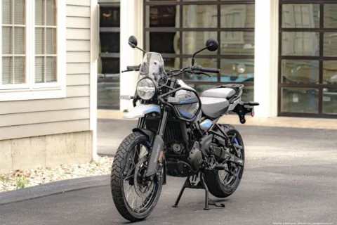 Another view of 2025 Royal Enfield Himalayan 450 Slate Poppy Blue for sale in Spencer, MA at Spencer Showroom