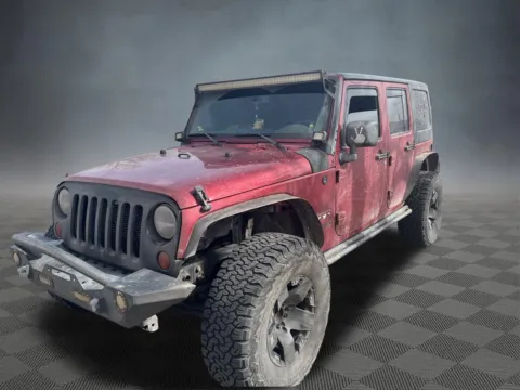 Photos of 2013 Jeep Wrangler Unlimited Sahara for sale in Colorado Springs, CO at McCloskey Truck Town (Licensed as McCloskey Motors Inc.)