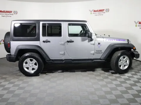 Another view of 2014 Jeep Wrangler Unlimited Sport for sale in Colorado Springs, CO at McCloskey Truck Town (Licensed as McCloskey Motors Inc.)