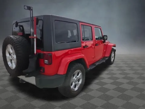 Photos of 2015 Jeep Wrangler Unlimited Sahara for sale in Colorado Springs, CO at McCloskey Truck Town (Licensed as McCloskey Motors Inc.)