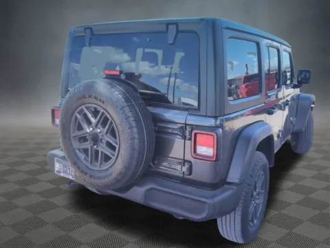 Photos of 2024 Jeep Wrangler Sport S for sale in Colorado Springs, CO at McCloskey Truck Town (Licensed as McCloskey Motors Inc.)