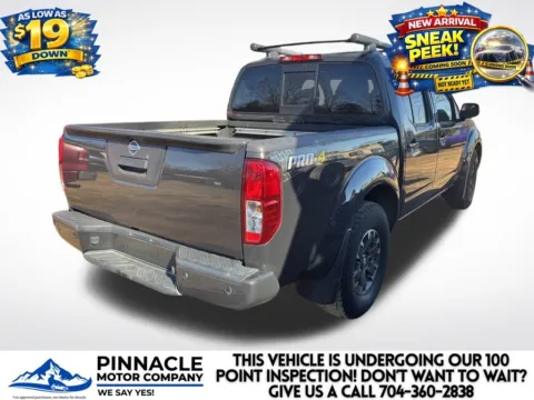 Photos of 2014 Nissan Frontier PRO-4X for sale in Mooresville, NC at Pinnacle Motor Company LKN