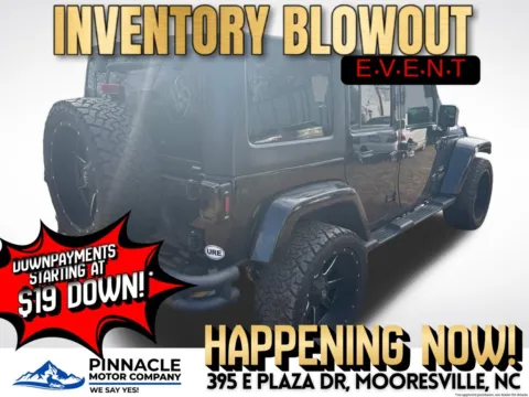 Another view of 2014 Jeep Wrangler Unlimited Sahara for sale in Mooresville, NC at Pinnacle Motor Company LKN