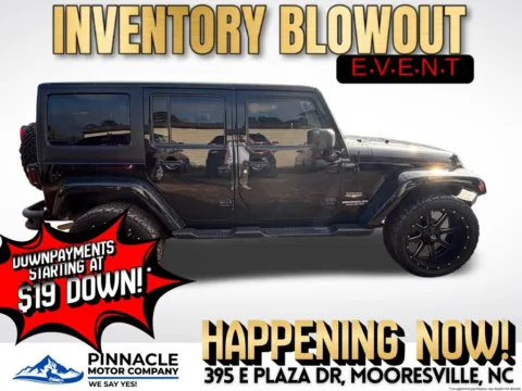 Photos of 2014 Jeep Wrangler Unlimited Sahara for sale in Mooresville, NC at Pinnacle Motor Company LKN