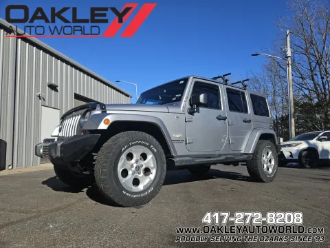 Silver 2013 Jeep Wrangler Unlimited Sahara for sale in Branson West, MO