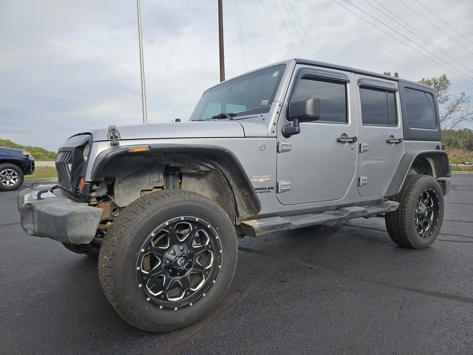 Silver 2013 Jeep Wrangler Unlimited Sahara for sale in Branson West, MO