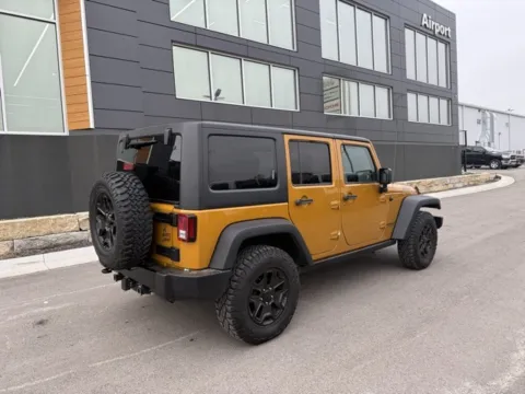 Another view of 2014 Jeep Wrangler Unlimited Willys for sale in Platte City, MO at Airport Chrysler Dodge Jeep Ram