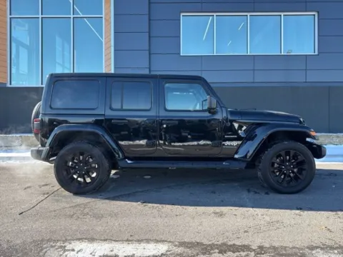 Photos of 2023 Jeep Wrangler Sahara 4xe for sale in Platte City, MO at Airport Chrysler Dodge Jeep Ram