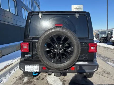More photos of 2023 Jeep Wrangler Sahara 4xe at Airport Chrysler Dodge Jeep Ram, MO