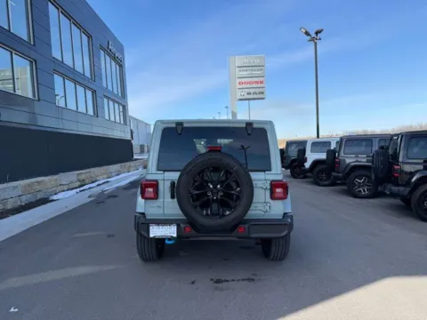 More photos of 2024 Jeep Wrangler Sahara 4xe at Airport Chrysler Dodge Jeep Ram, MO