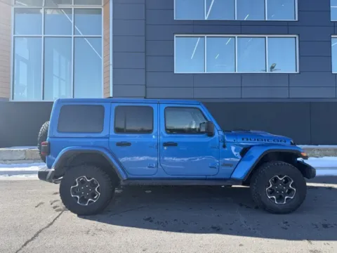 Photos of 2022 Jeep Wrangler Unlimited Rubicon 4xe for sale in Platte City, MO at Airport Chrysler Dodge Jeep Ram