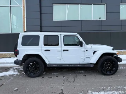 Photos of 2023 Jeep Wrangler Sahara 4xe for sale in Platte City, MO at Airport Chrysler Dodge Jeep Ram