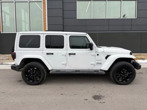 Photos of 2023 Jeep Wrangler Sahara 4xe for sale in Platte City, MO at Airport Chrysler Dodge Jeep Ram