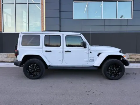 Photos of 2023 Jeep Wrangler Sahara 4xe for sale in Platte City, MO at Airport Chrysler Dodge Jeep Ram