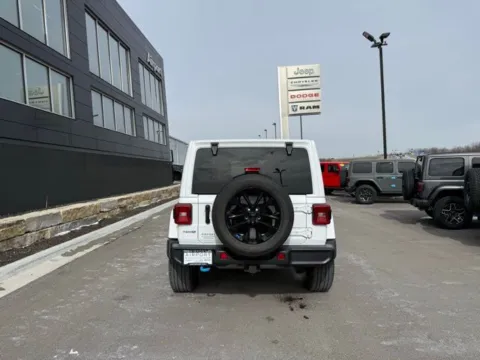 More photos of 2023 Jeep Wrangler Sahara 4xe at Airport Chrysler Dodge Jeep Ram, MO