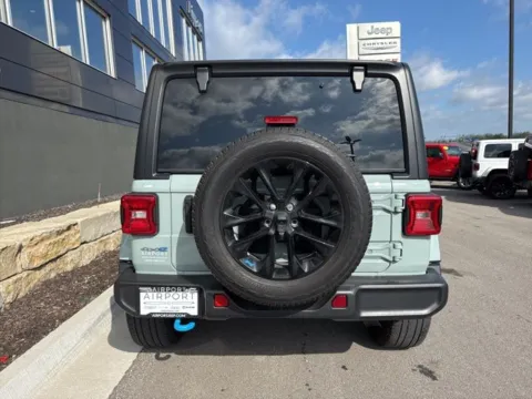 More photos of 2023 Jeep Wrangler Sahara 4xe at Airport Chrysler Dodge Jeep Ram, MO