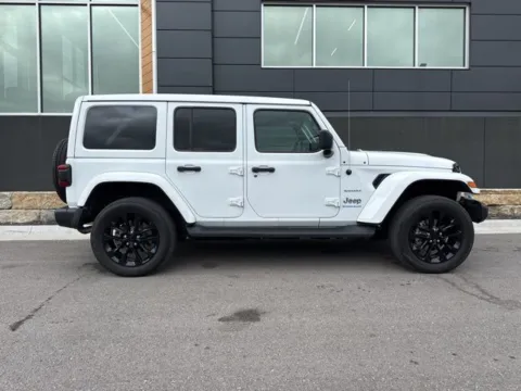 Photos of 2023 Jeep Wrangler Sahara 4xe for sale in Platte City, MO at Airport Chrysler Dodge Jeep Ram