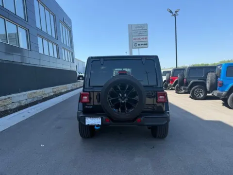 More photos of 2023 Jeep Wrangler Sahara 4xe at Airport Chrysler Dodge Jeep Ram, MO