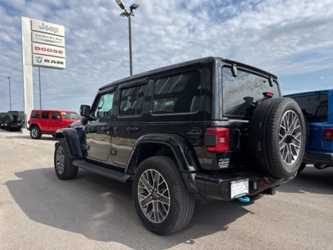 More photos of 2023 Jeep Wrangler Sahara 4xe at Airport Chrysler Dodge Jeep Ram, MO