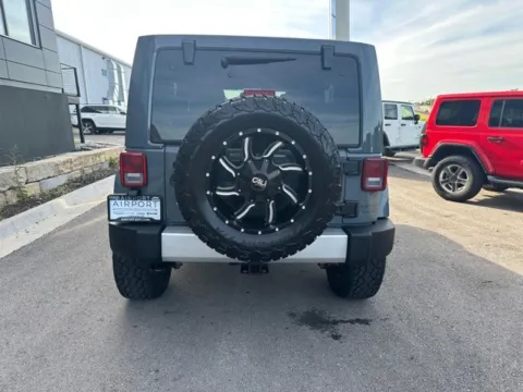 More photos of 2014 Jeep Wrangler Unlimited Sahara at Airport Chrysler Dodge Jeep Ram, MO