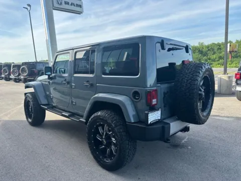 Another view of 2014 Jeep Wrangler Unlimited Sahara for sale in Platte City, MO at Airport Chrysler Dodge Jeep Ram