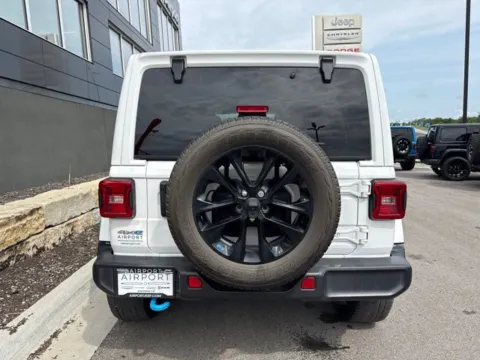 More photos of 2023 Jeep Wrangler Sahara 4xe at Airport Chrysler Dodge Jeep Ram, MO