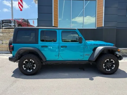 Photos of 2024 Jeep Wrangler Rubicon 4xe for sale in Platte City, MO at Airport Chrysler Dodge Jeep Ram