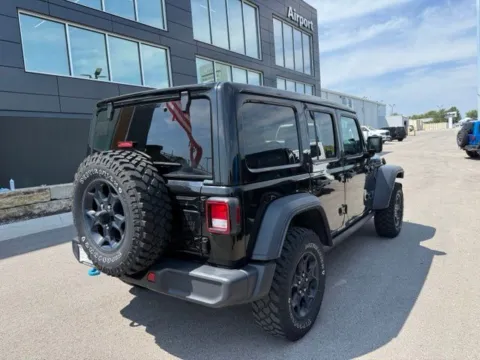Photos of 2023 Jeep Wrangler Willys 4xe for sale in Platte City, MO at Airport Chrysler Dodge Jeep Ram