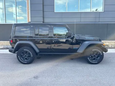 Photos of 2023 Jeep Wrangler Willys 4xe for sale in Platte City, MO at Airport Chrysler Dodge Jeep Ram