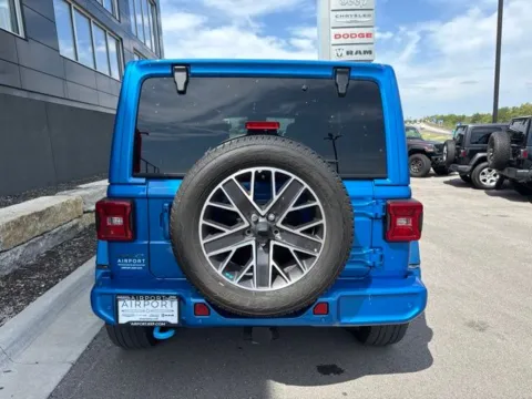 More photos of 2023 Jeep Wrangler Sahara 4xe at Airport Chrysler Dodge Jeep Ram, MO