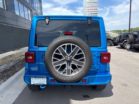 More photos of 2023 Jeep Wrangler Sahara 4xe at Airport Chrysler Dodge Jeep Ram, MO