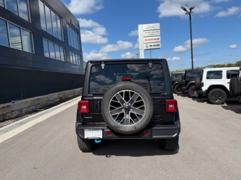 More photos of 2023 Jeep Wrangler Sahara 4xe at Airport Chrysler Dodge Jeep Ram, MO