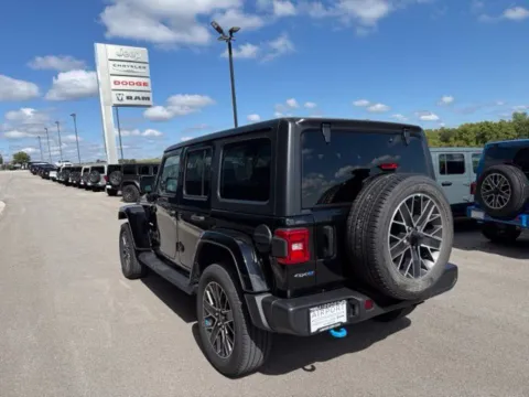 More photos of 2023 Jeep Wrangler Sahara 4xe at Airport Chrysler Dodge Jeep Ram, MO